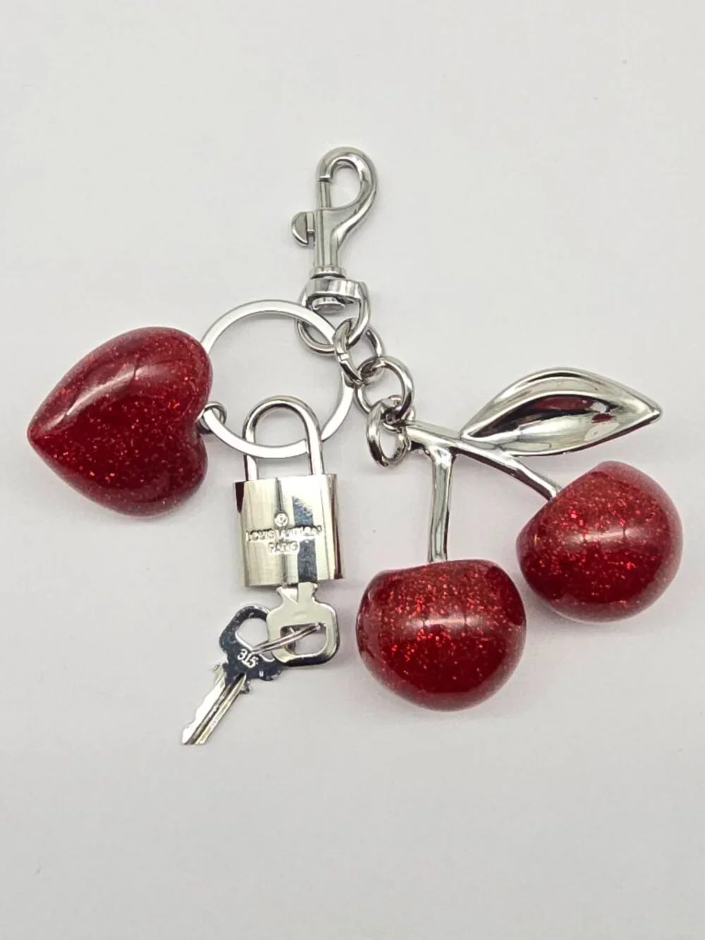 Authentic Louis Vuitton Silver Padlock with Unbranded Red Cherry Charm